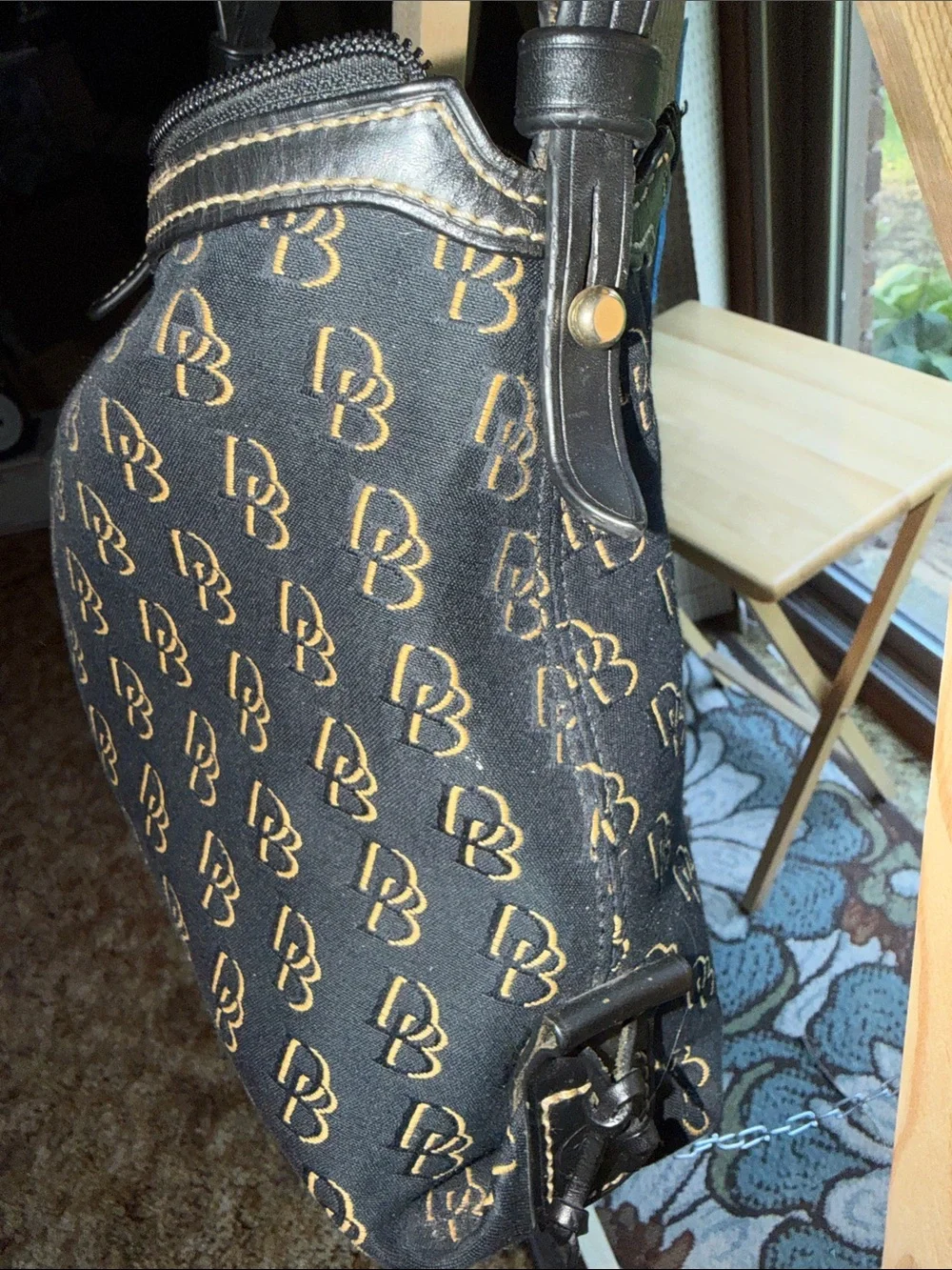 Dooney & Bourke Black with Gold Monogram Hobo Bag